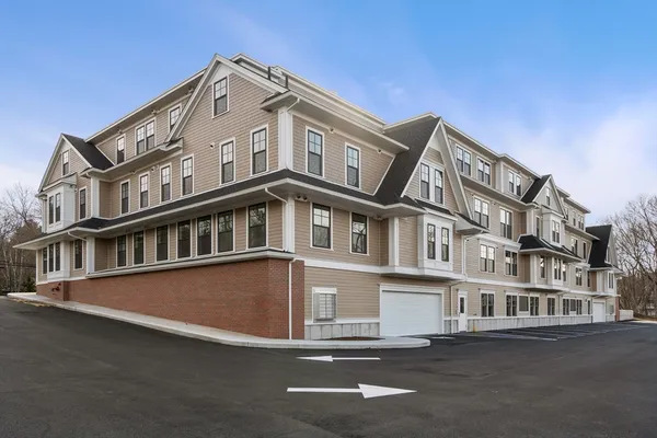 a front view of a building with balcony
