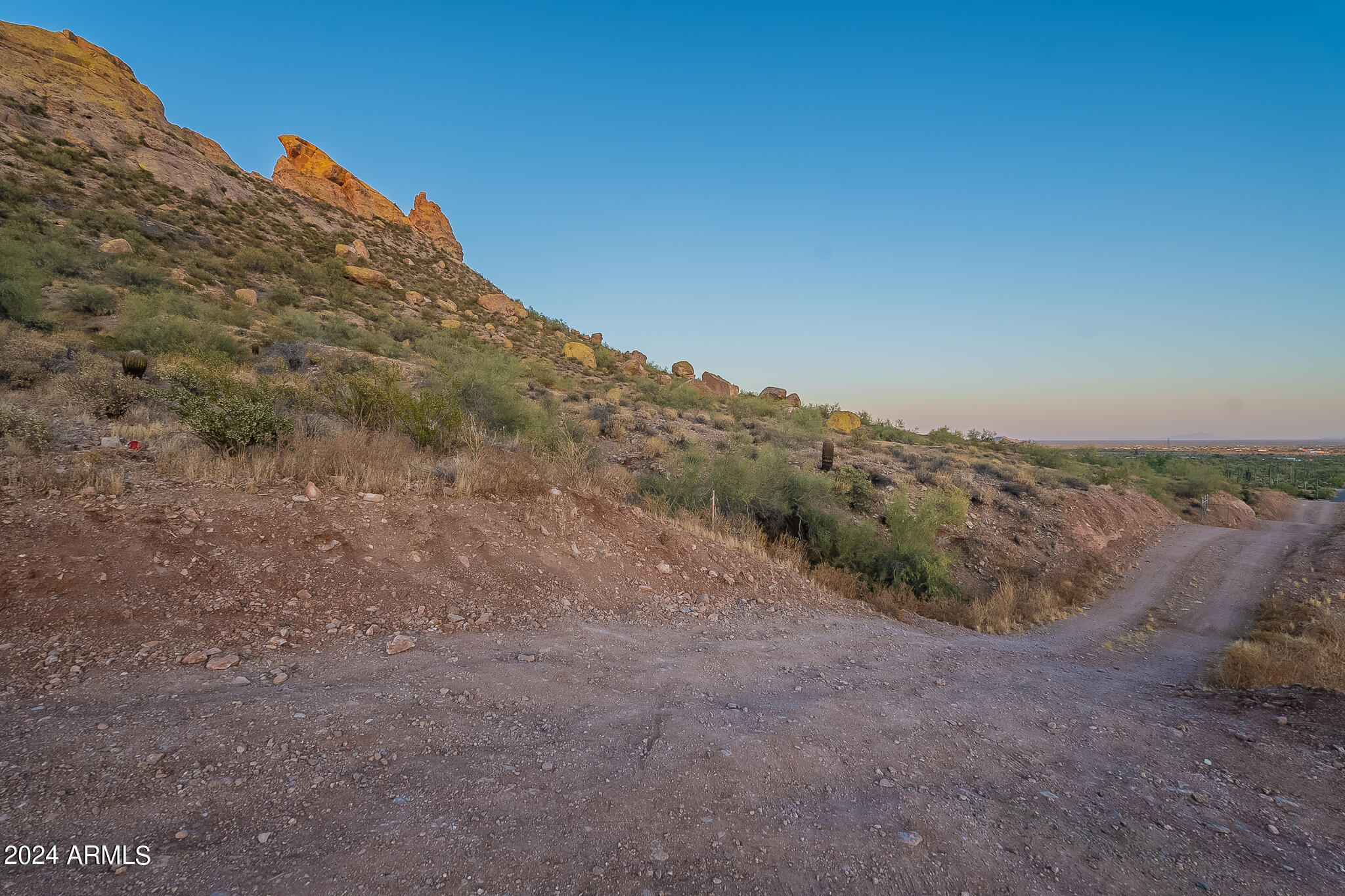 0 North Cortez Road, Unit LOT 1 Apache Junction, AZ 85119 - Photo 17 of 27 a view of a dry yard with mountains in the background