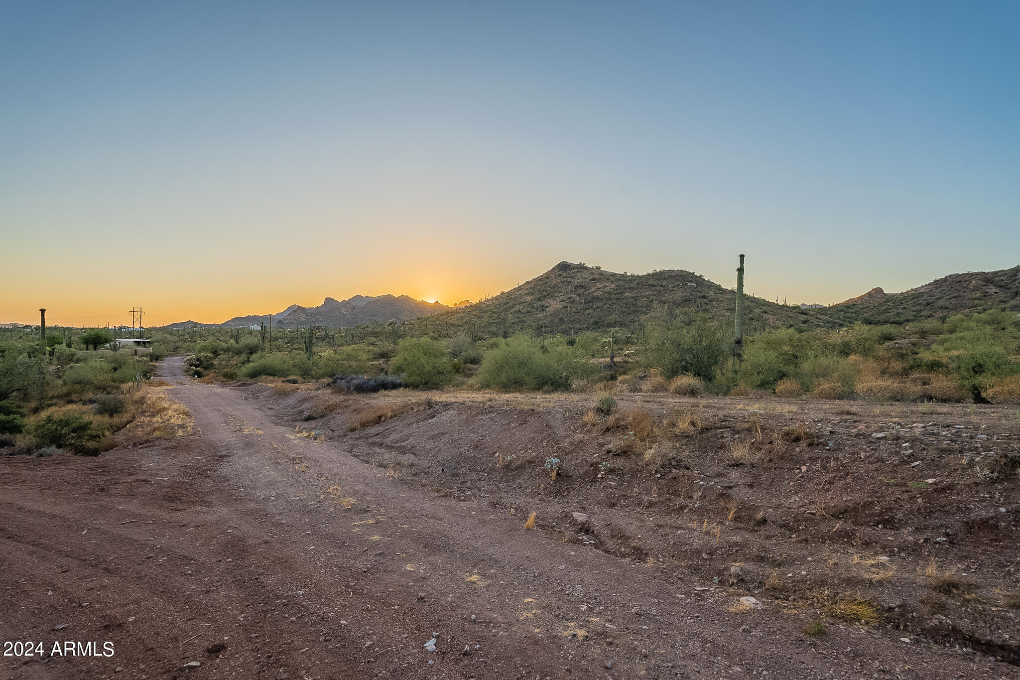 0 North Cortez Road, Unit LOT 1 Apache Junction, AZ 85119 - Photo 23 of 27 a view of an outdoor space with green field and trees