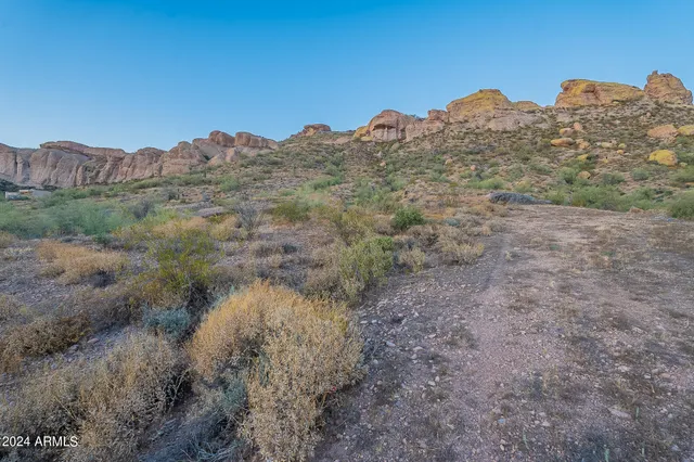 a view of a street with a building in the background