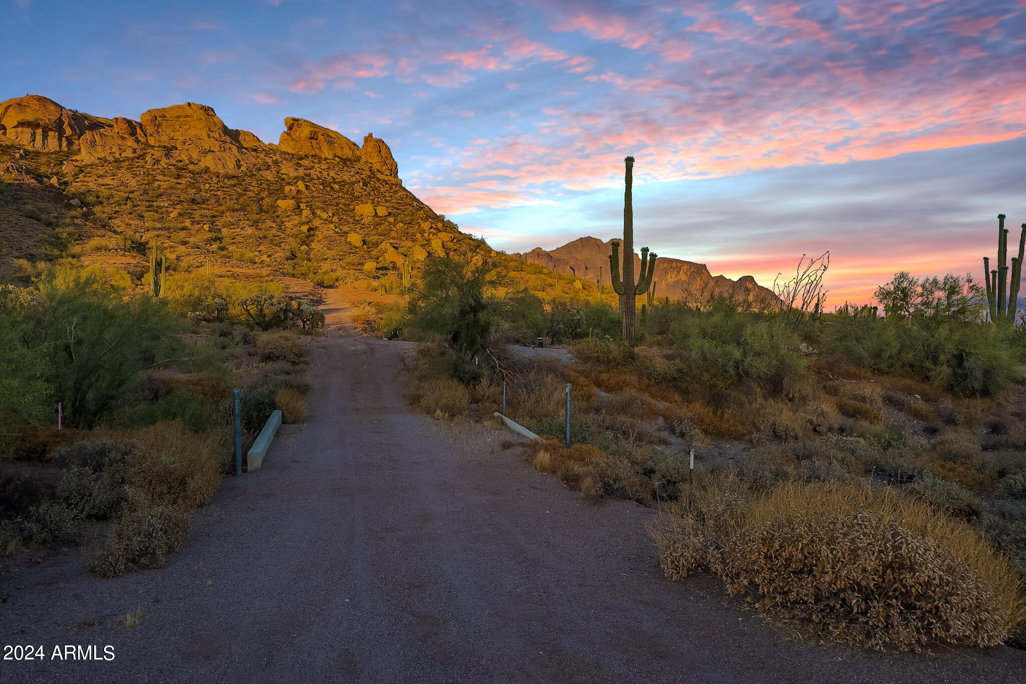 0 North Cortez Road, Unit LOT 1 Apache Junction, AZ 85119 - Photo 26 of 27 a view of a street with a building in the background
