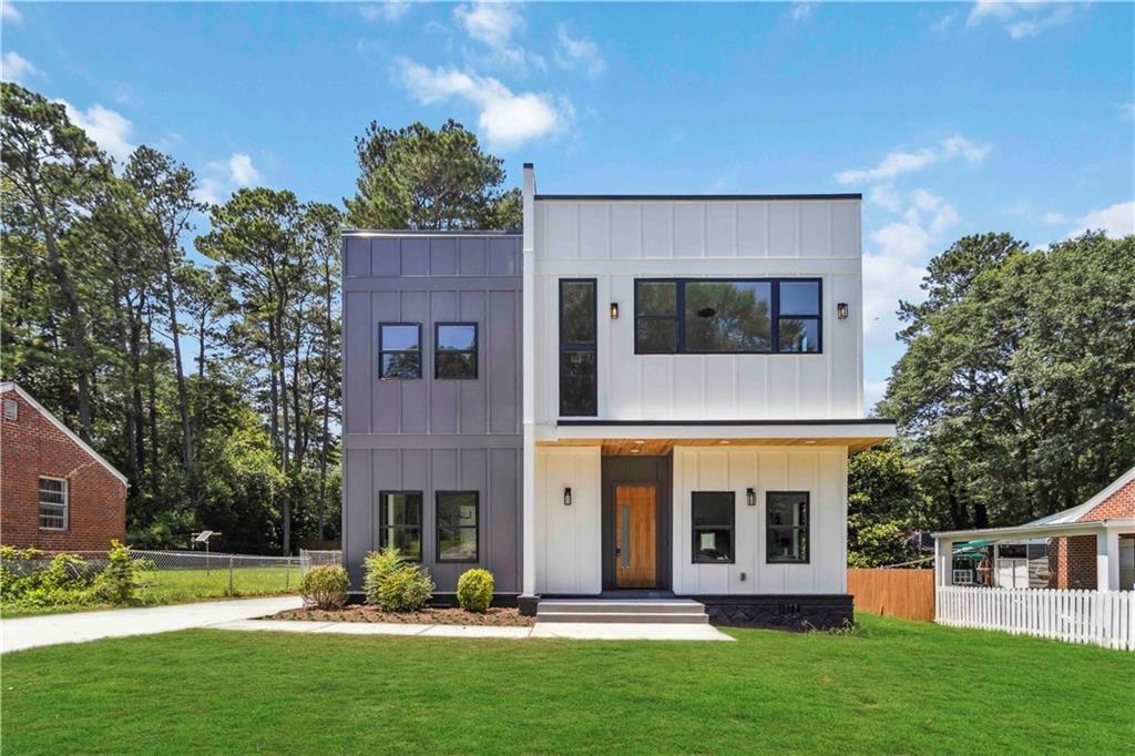 1554 Columbia Circle Decatur, GA 30032 - Photo 1 of 55 a front view of a house with garden