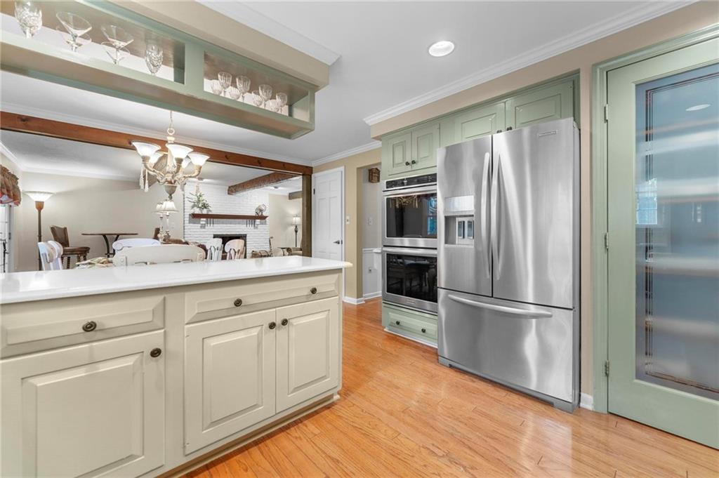 829 Ridgefield Avenue Pittsburgh, PA 15216 - Photo 14 of 50 a kitchen with stainless steel appliances a refrigerator sink and cabinets