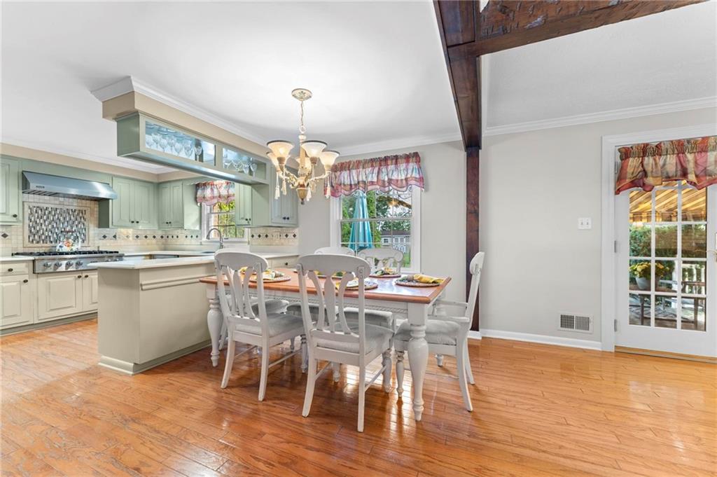 829 Ridgefield Avenue Pittsburgh, PA 15216 - Photo 15 of 50 a view of a dining room with furniture window and wooden floor