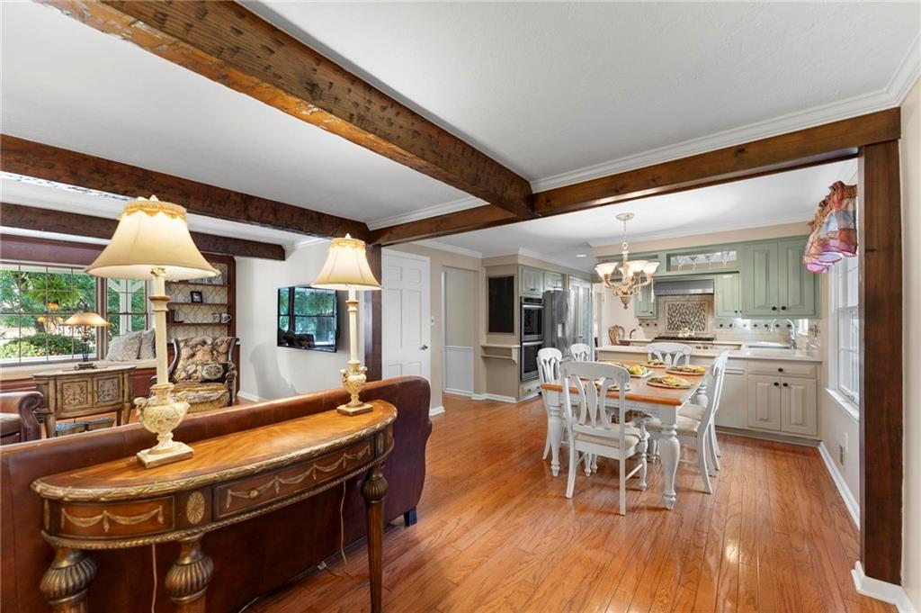 829 Ridgefield Avenue Pittsburgh, PA 15216 - Photo 17 of 50 a dining room with furniture and wooden floor