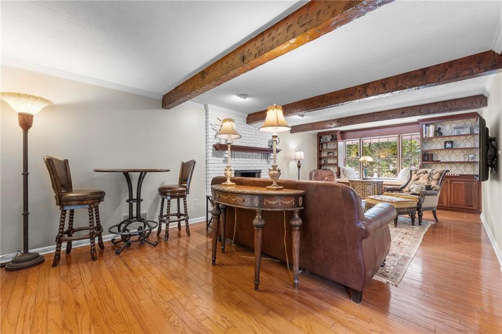 829 Ridgefield Avenue Pittsburgh, PA 15216 - Photo 18 of 50 a living room with furniture dining table and a large window