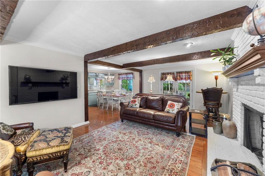 829 Ridgefield Avenue Pittsburgh, PA 15216 - Photo 20 of 50 a living room with furniture and a flat screen tv