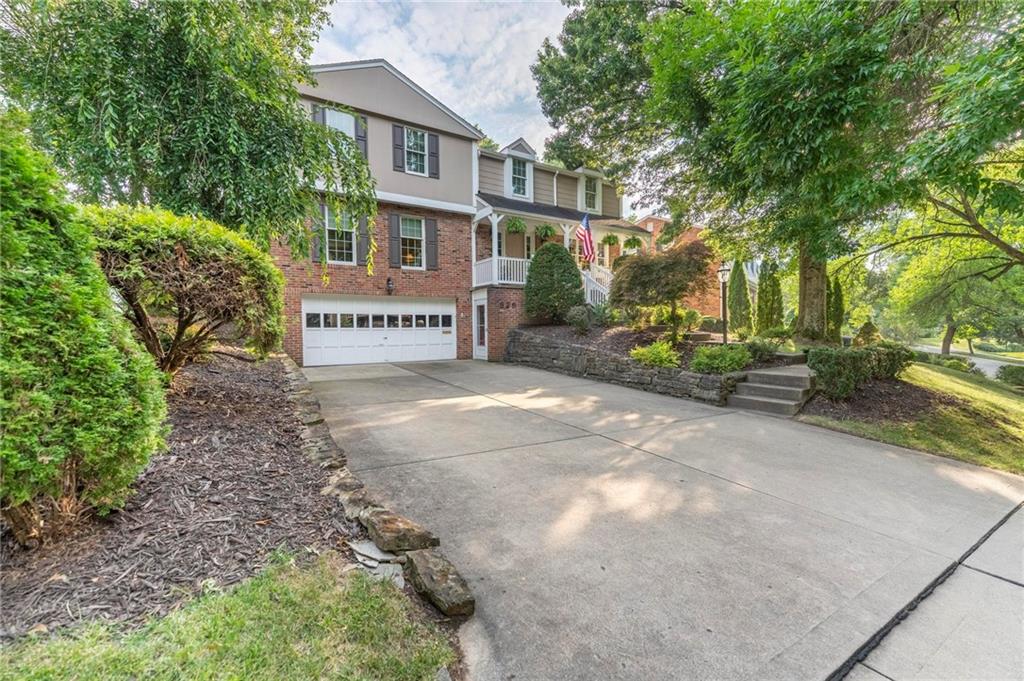 829 Ridgefield Avenue Pittsburgh, PA 15216 - Photo 2 of 50 a front view of a house with garden