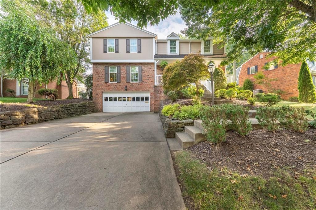 829 Ridgefield Avenue Pittsburgh, PA 15216 - Photo 3 of 50 a front view of a house with garden