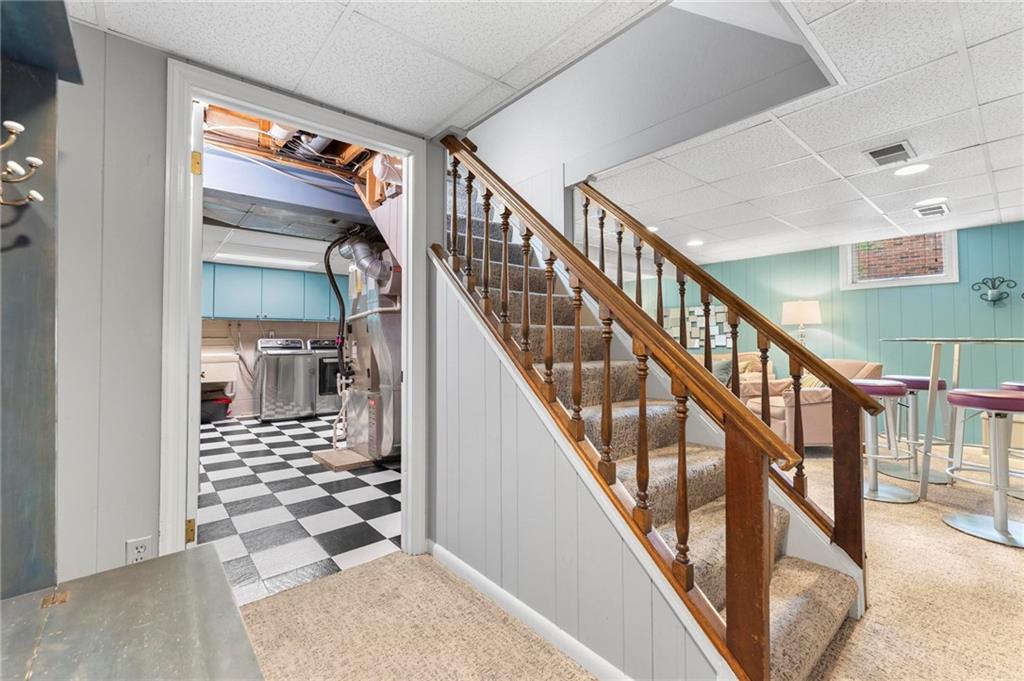 829 Ridgefield Avenue Pittsburgh, PA 15216 - Photo 38 of 50 a view of staircase with wooden floor and white walls