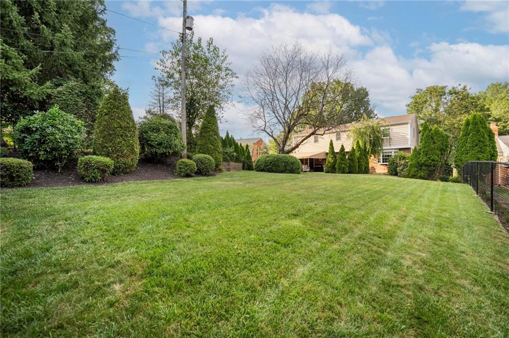 829 Ridgefield Avenue Pittsburgh, PA 15216 - Photo 47 of 50 a view of a field of grass and trees