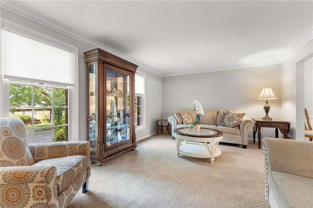 829 Ridgefield Avenue Pittsburgh, PA 15216 - Photo 8 of 50 a living room with furniture and a large window