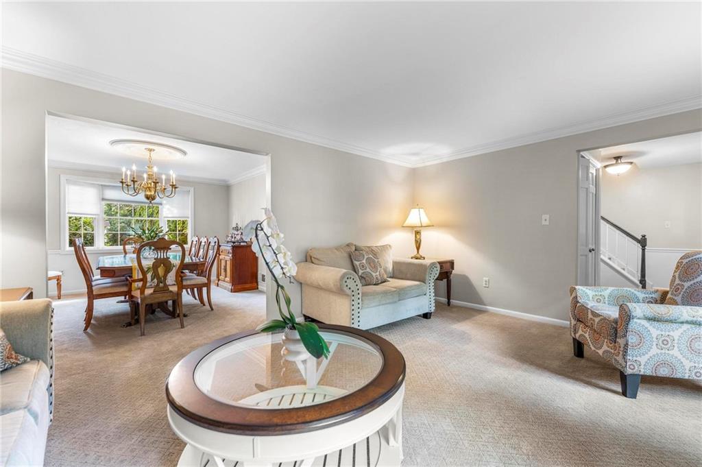 829 Ridgefield Avenue Pittsburgh, PA 15216 - Photo 9 of 50 a living room with furniture and a table