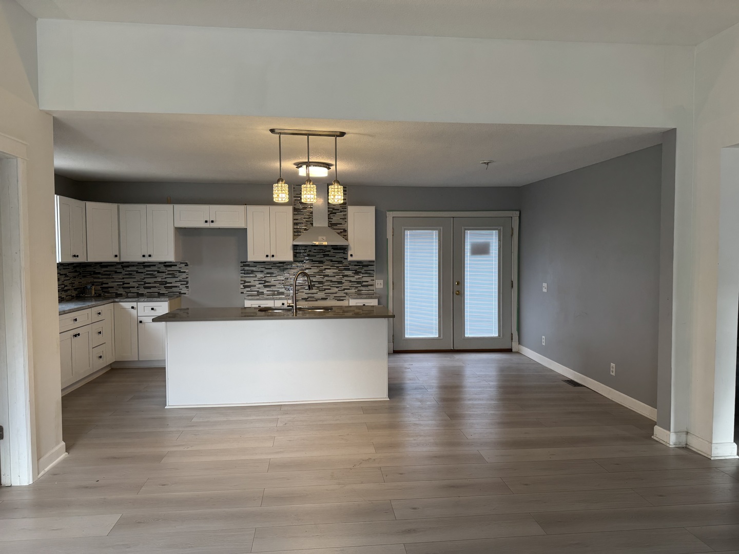 612 15th Avenue Sterling, IL 61081 - Photo 2 of 33 a view of kitchen with cabinets and wooden floor