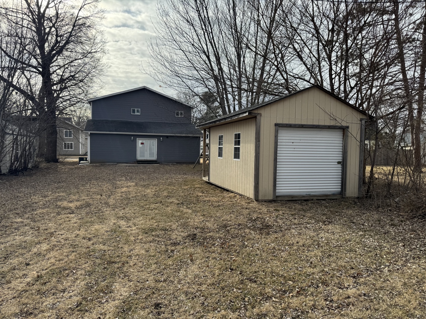 612 15th Avenue Sterling, IL 61081 - Photo 30 of 33 a house with a tree in front of it