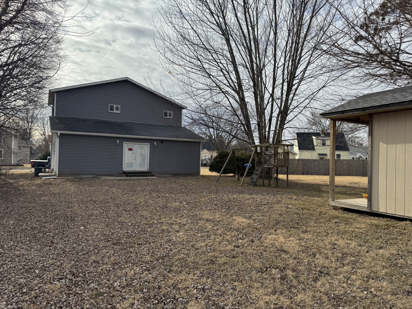 612 15th Avenue Sterling, IL 61081 - Photo 32 of 33 a house with trees in front of it