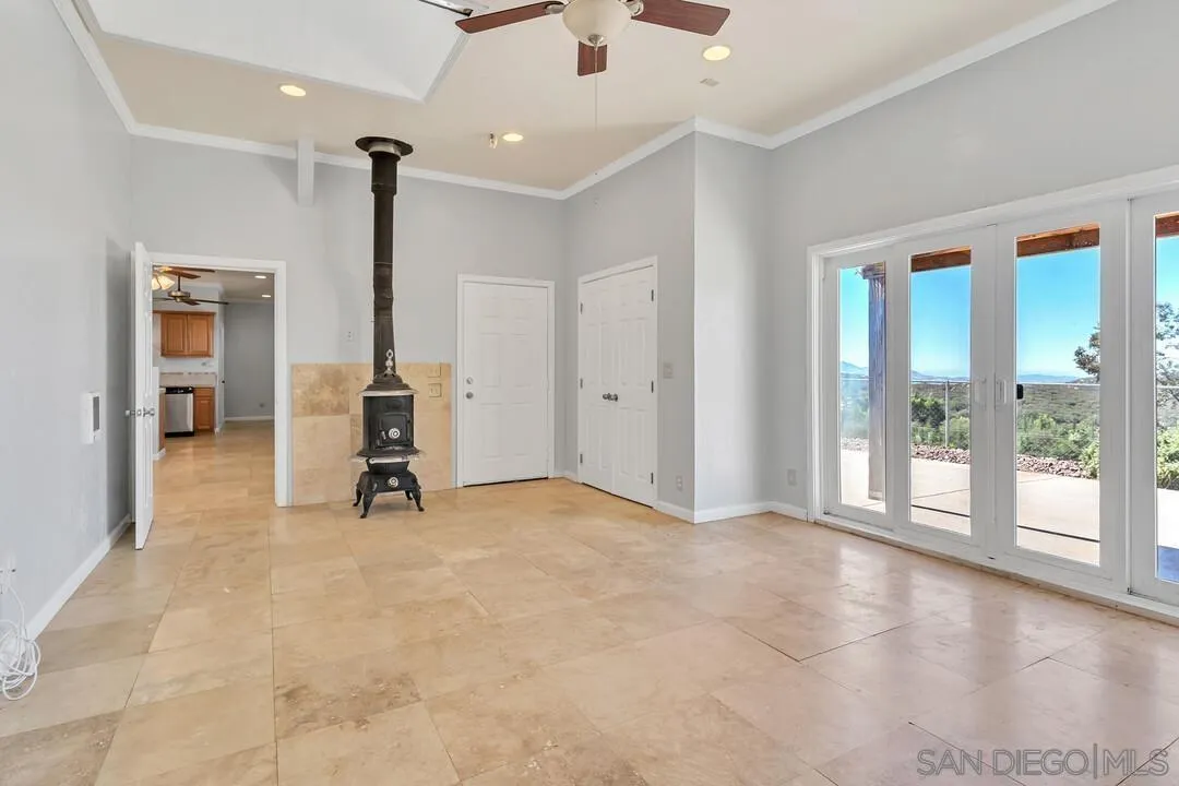 23611-13 Old Ranch Road Alpine, CA 91901 - Photo 12 of 25 a view of an empty room with a window