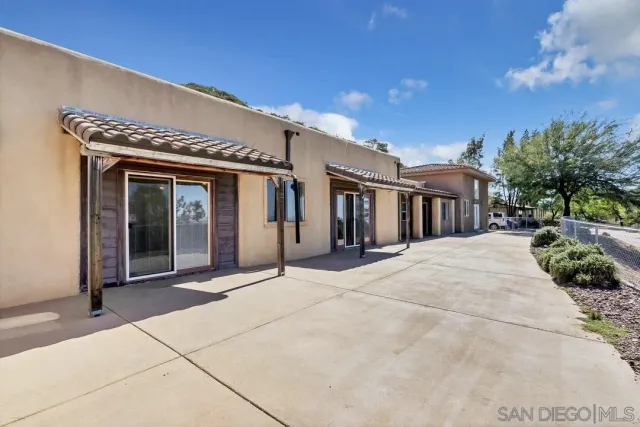 a view of a house with entertaining space