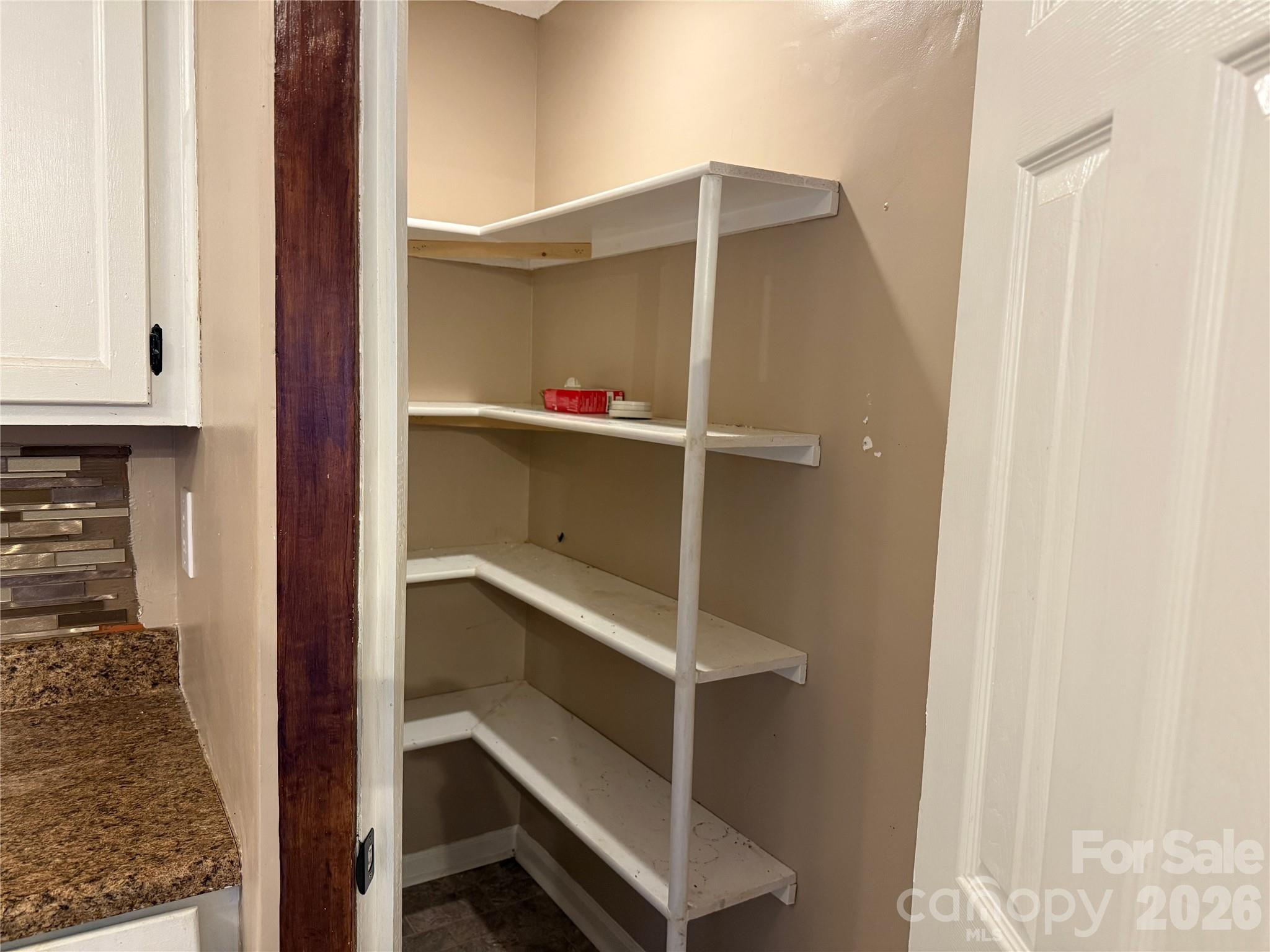 309 Mel Lane Crouse, NC 28033 - Photo 14 of 35 a view of an empty room and wooden floor