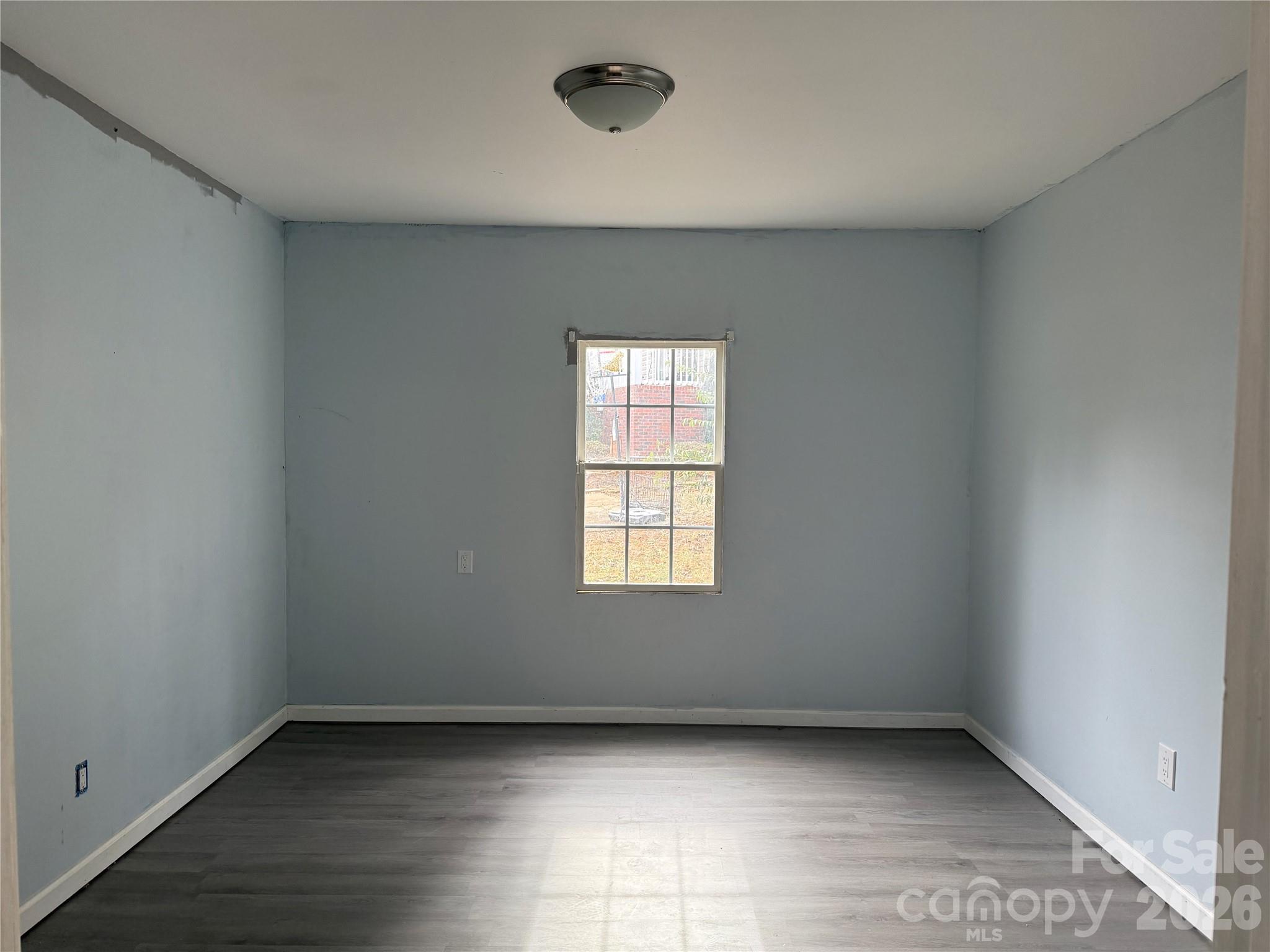 309 Mel Lane Crouse, NC 28033 - Photo 19 of 35 an empty room with a window