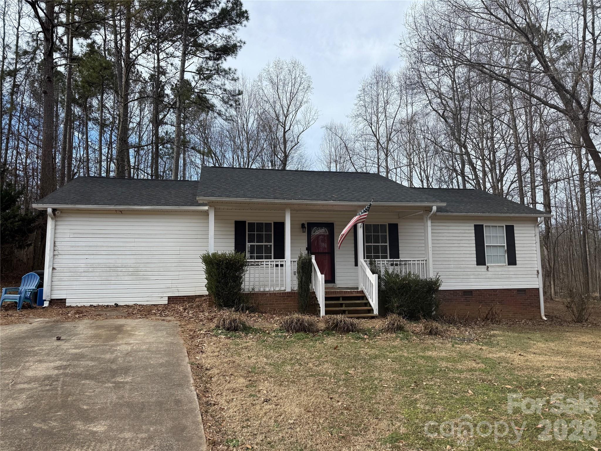 309 Mel Lane Crouse, NC 28033 - Photo 2 of 35 a front view of a house with yard