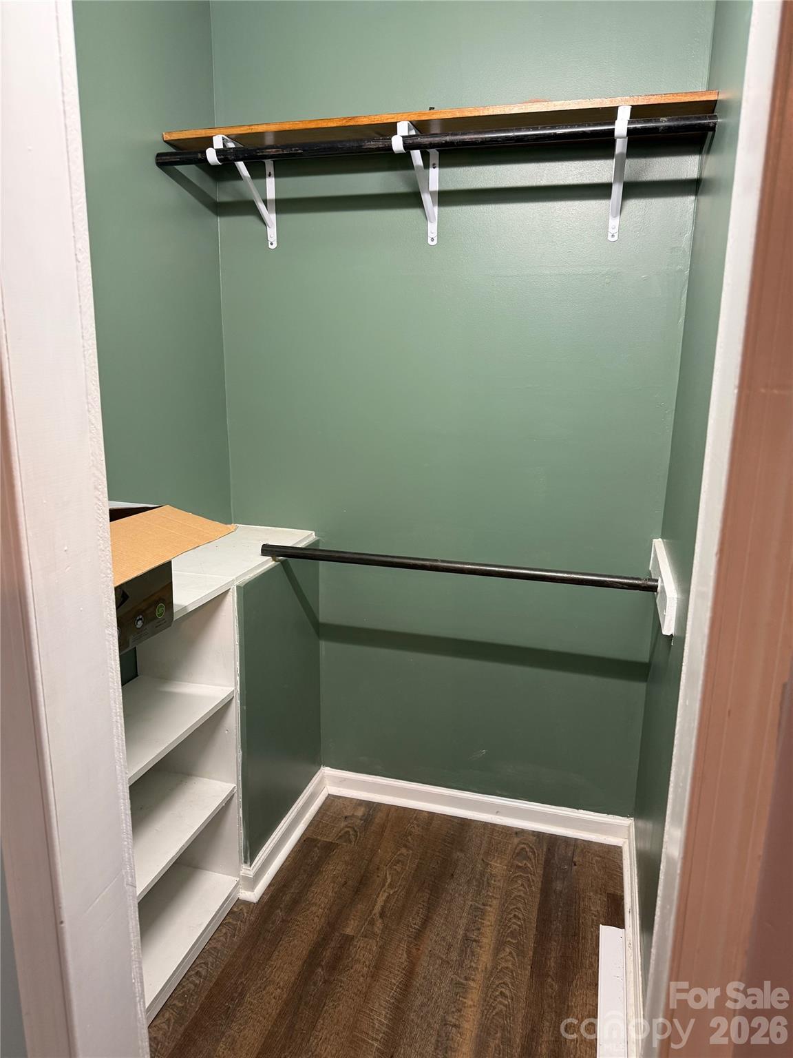 309 Mel Lane Crouse, NC 28033 - Photo 23 of 35 a view of walk in closet with clothes