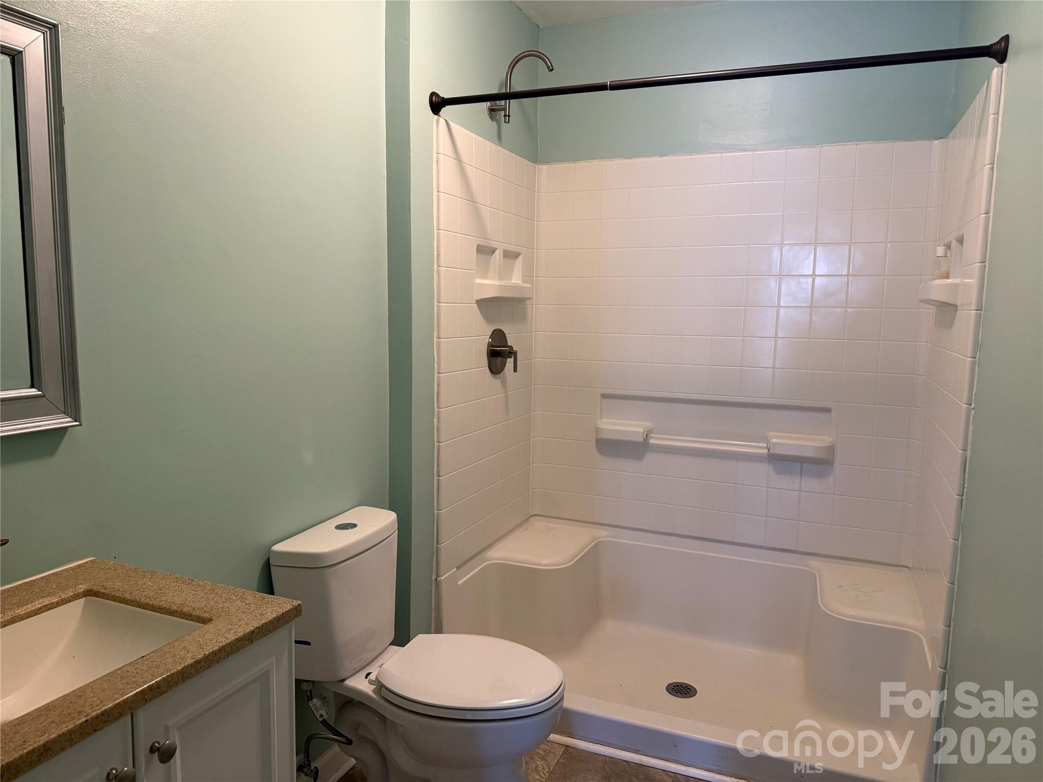 309 Mel Lane Crouse, NC 28033 - Photo 26 of 35 a bathroom with a shower and a toilet