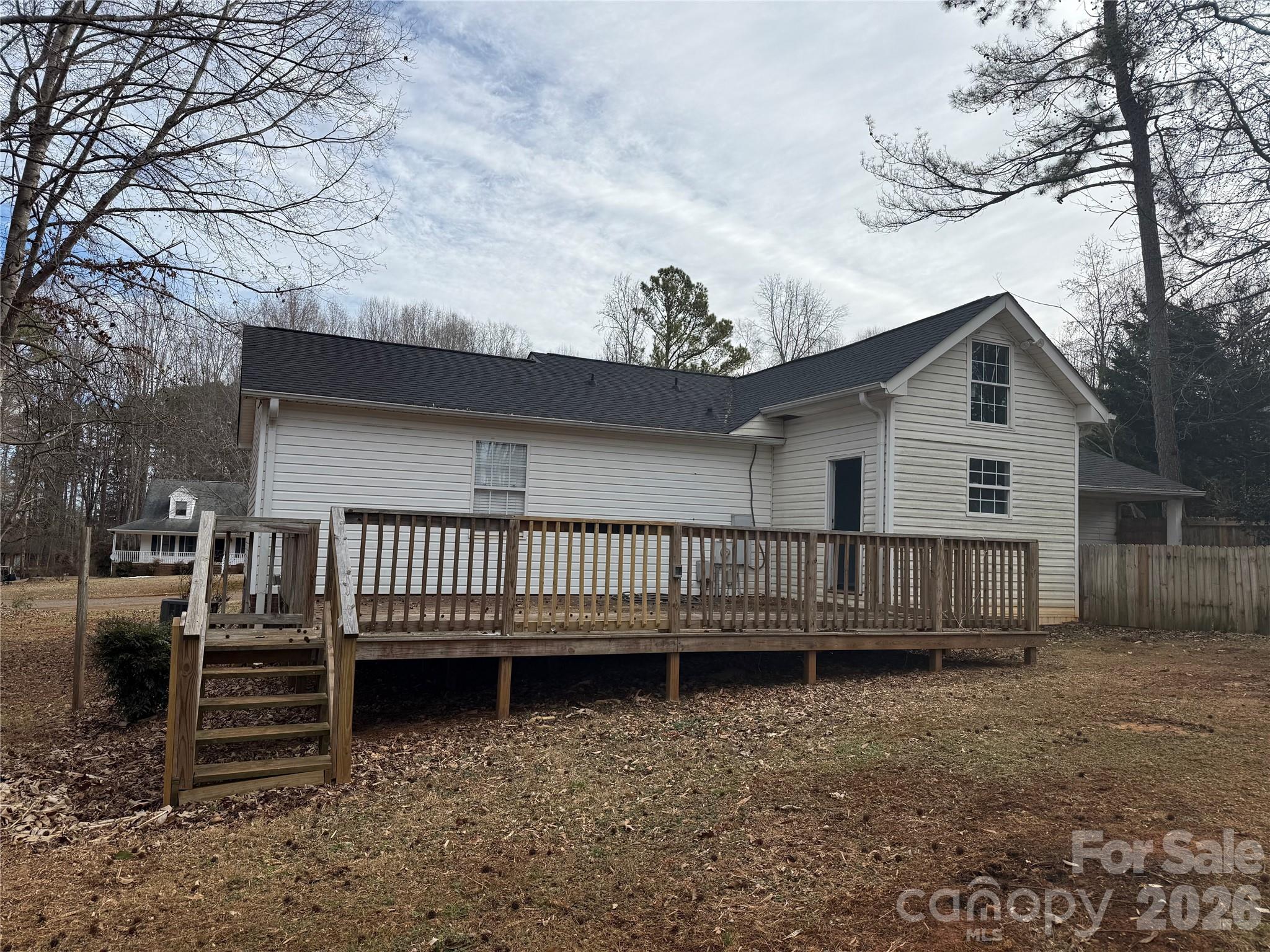 309 Mel Lane Crouse, NC 28033 - Photo 28 of 35 a view of a house with a yard