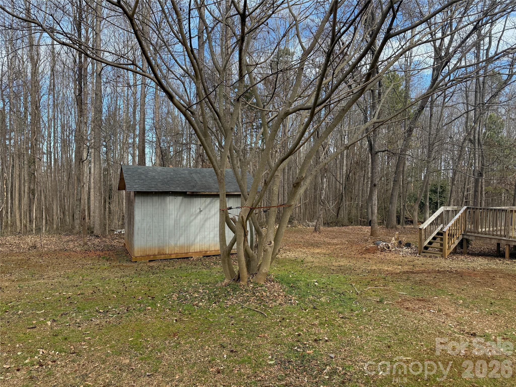 309 Mel Lane Crouse, NC 28033 - Photo 31 of 35 a view of outdoor space with deck and tree