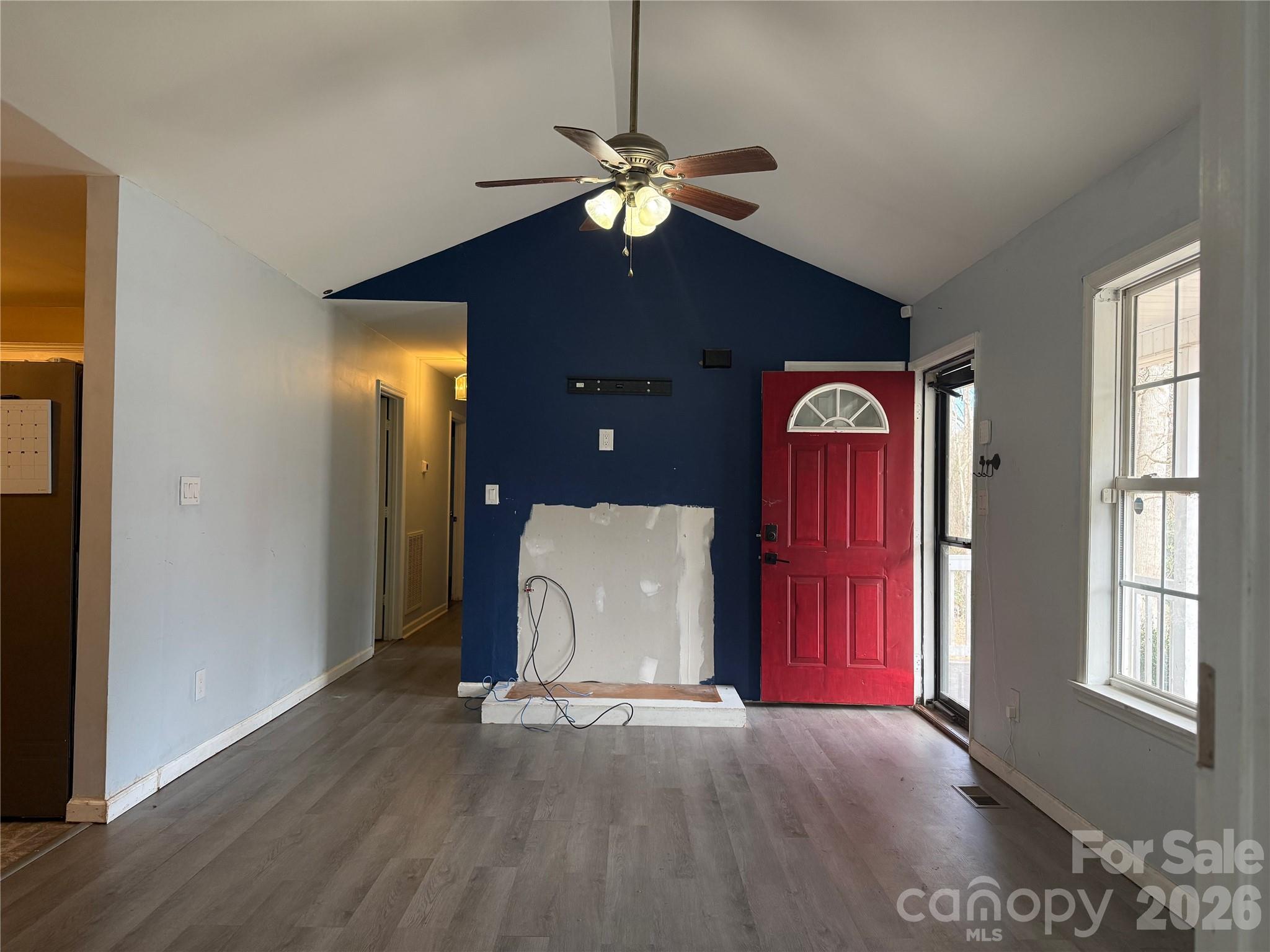 309 Mel Lane Crouse, NC 28033 - Photo 8 of 35 a view of a livingroom with a ceiling fan and window