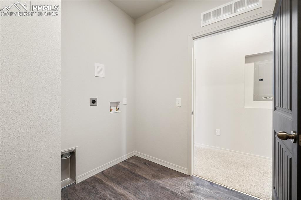 208 High Meadows Drive Florence, CO 81226 - Photo 14 of 32 a view of a small space with wooden floor