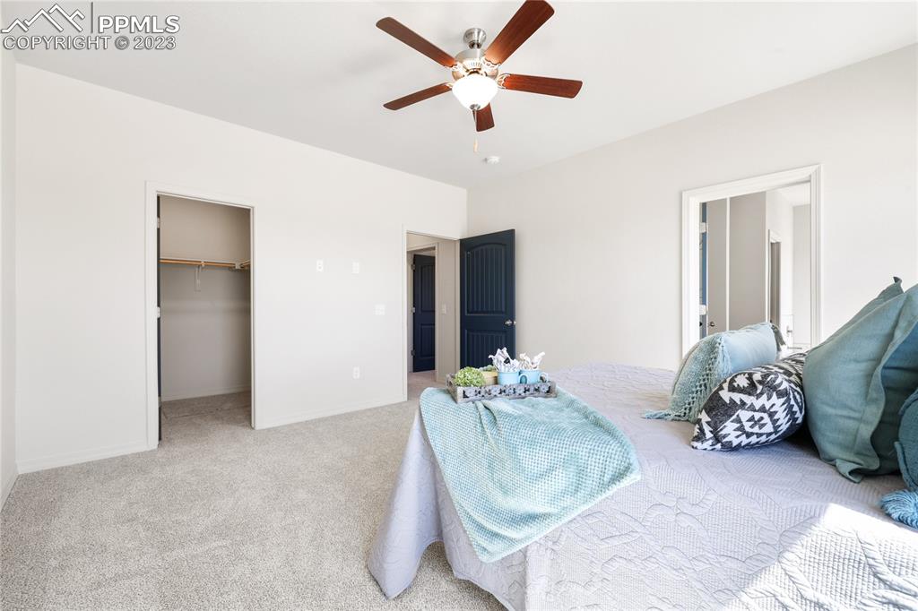 208 High Meadows Drive Florence, CO 81226 - Photo 18 of 32 a living room with furniture and white walls