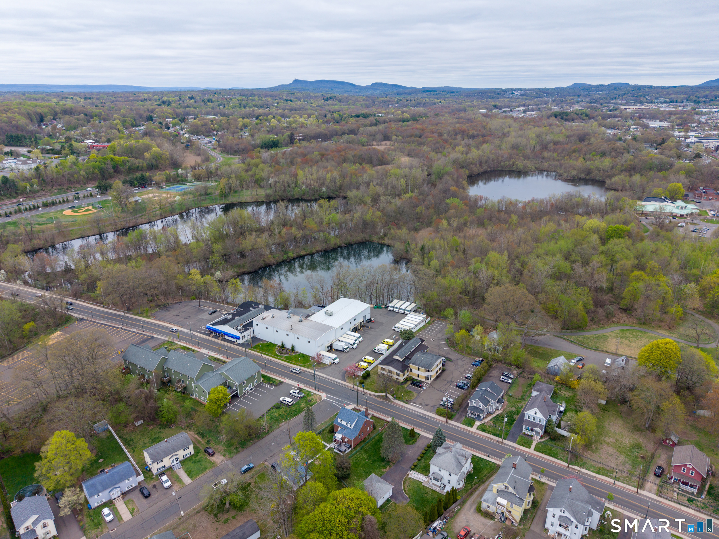 236 Hall Avenue Wallingford, CT 06492 - Photo 20 of 40 an aerial view of lake houses with outdoor seating
