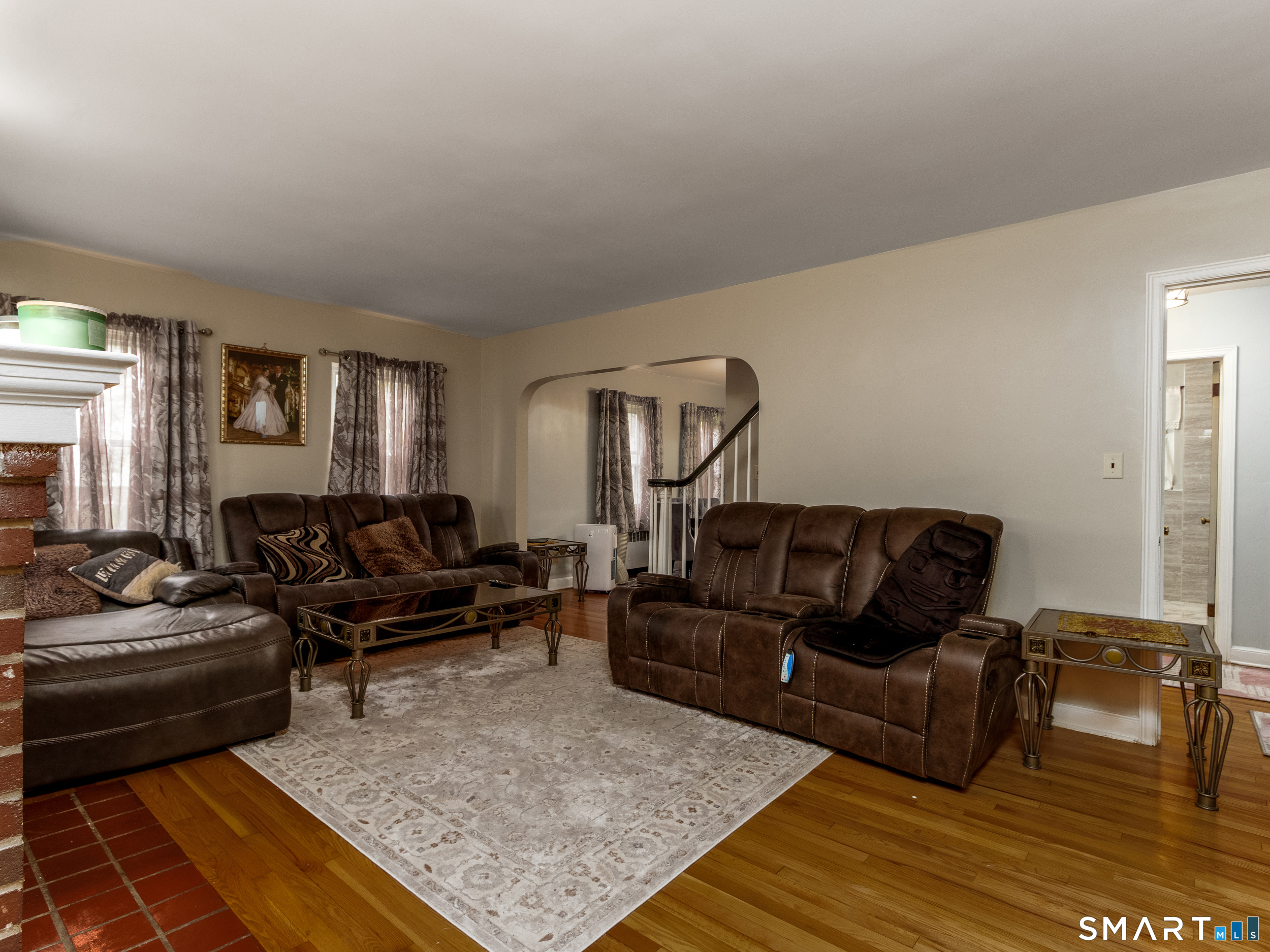 236 Hall Avenue Wallingford, CT 06492 - Photo 29 of 40 a living room with furniture and a rug