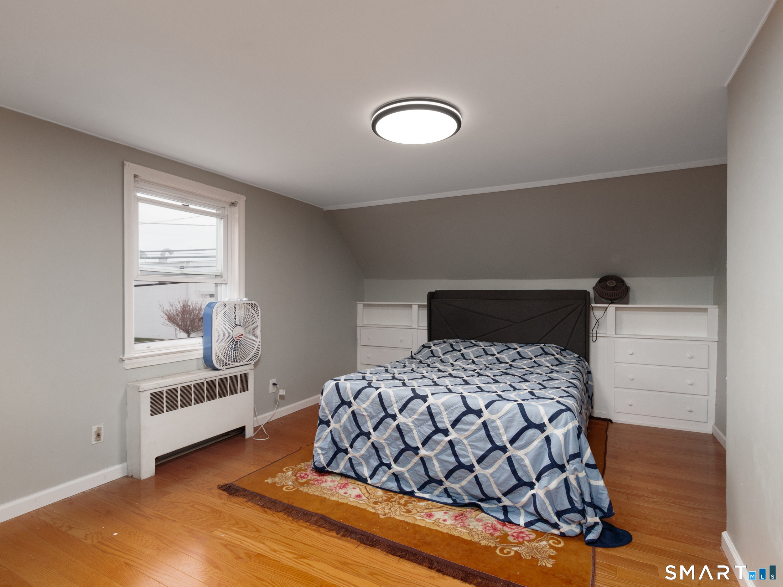 236 Hall Avenue Wallingford, CT 06492 - Photo 35 of 40 a bedroom with a bed and window