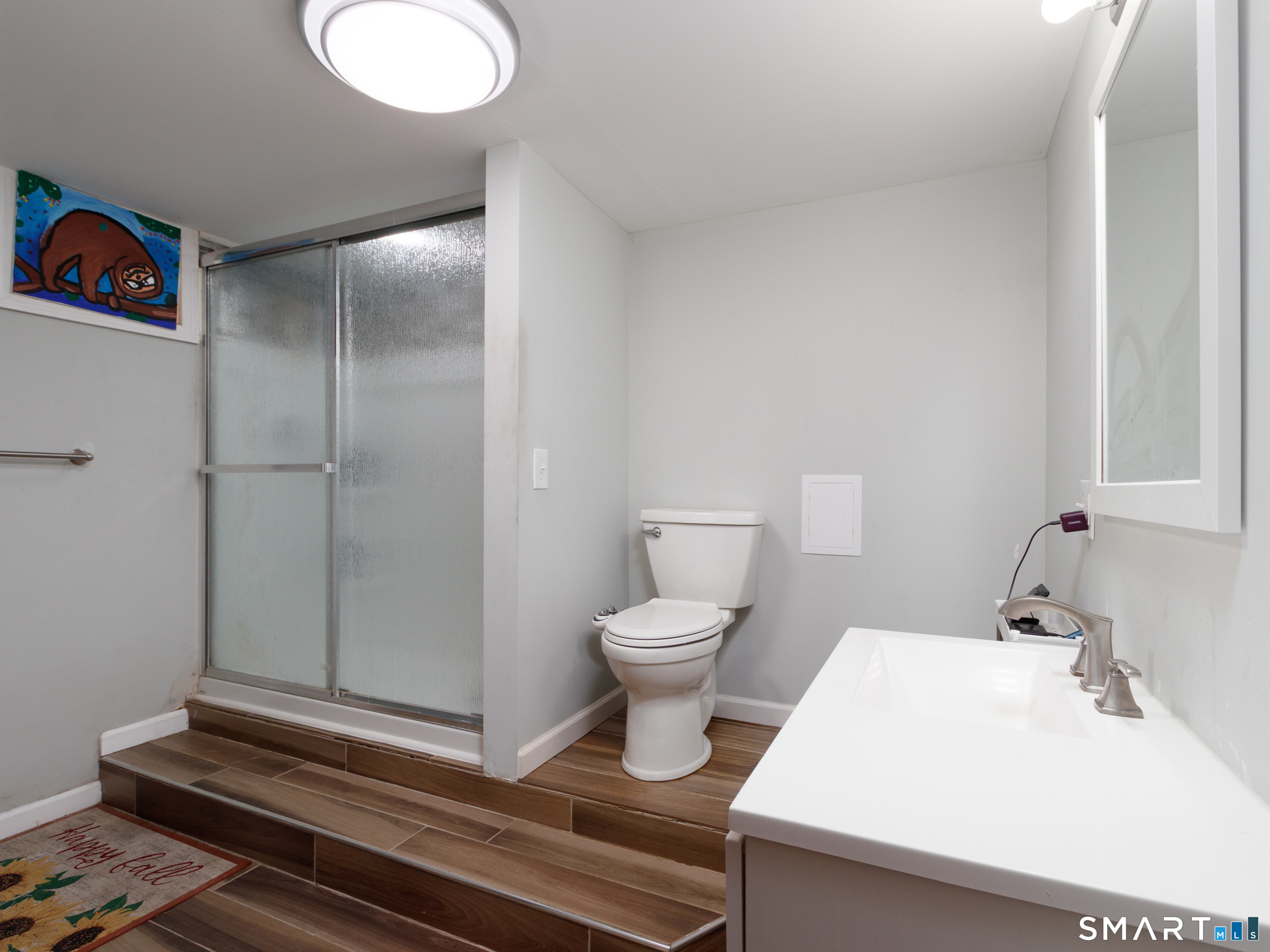 236 Hall Avenue Wallingford, CT 06492 - Photo 36 of 40 a bathroom with a sink and a toilet