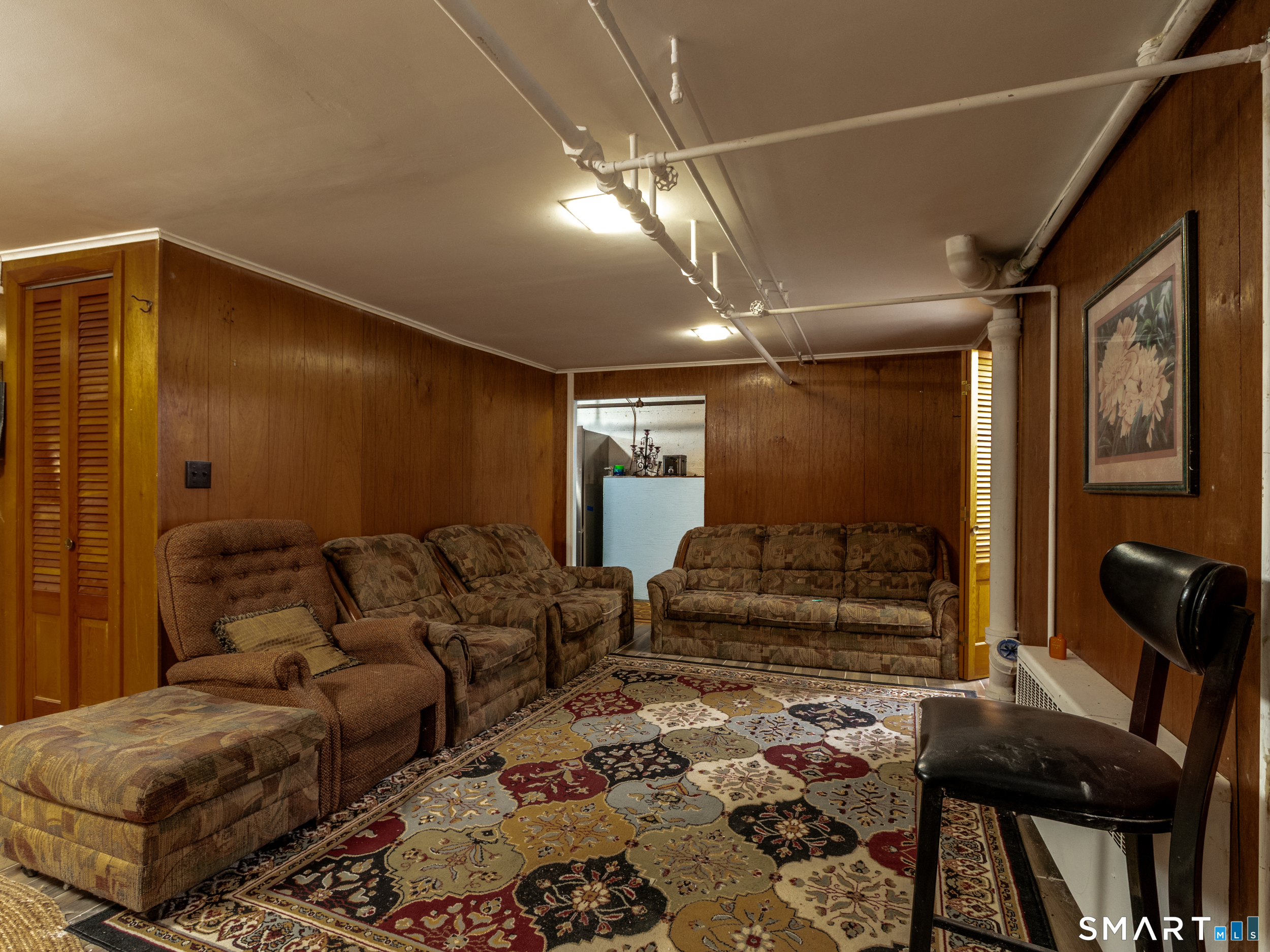 236 Hall Avenue Wallingford, CT 06492 - Photo 37 of 40 a living room with furniture and a rug