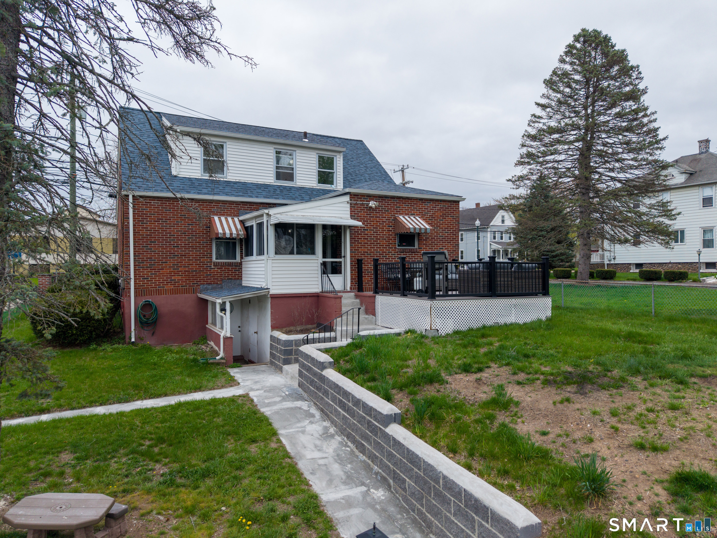 236 Hall Avenue Wallingford, CT 06492 - Photo 10 of 40 a front view of a house with garden