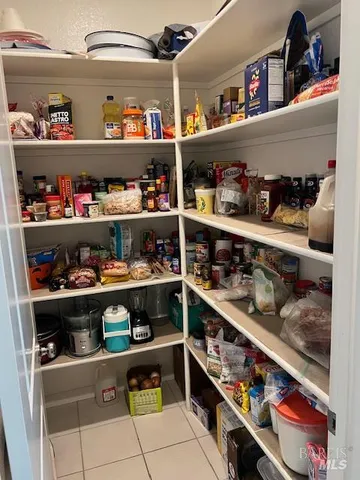 a room with wooden cabinets