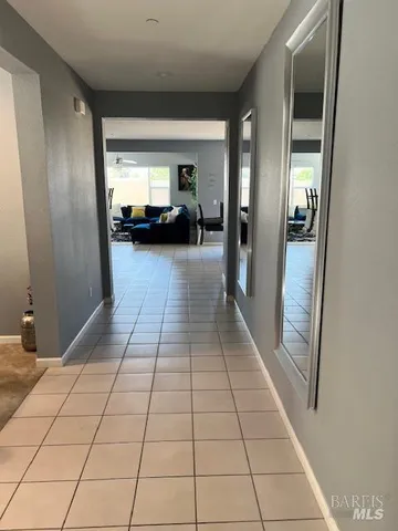 a view of a hallway view with staircase