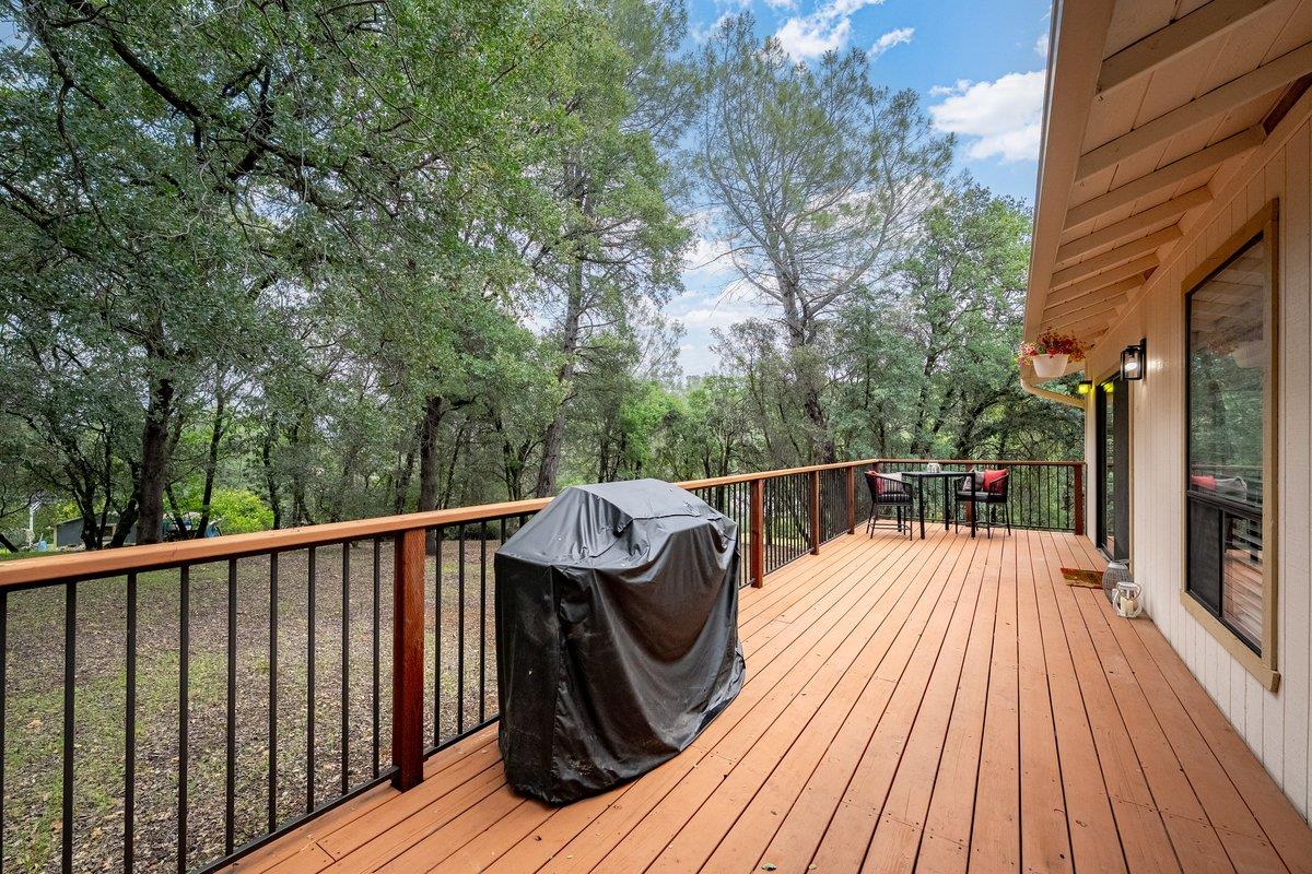 6561 Trinity Way Placerville, CA 95667 - Photo 57 of 58 a view of balcony with wooden floor and outdoor seating