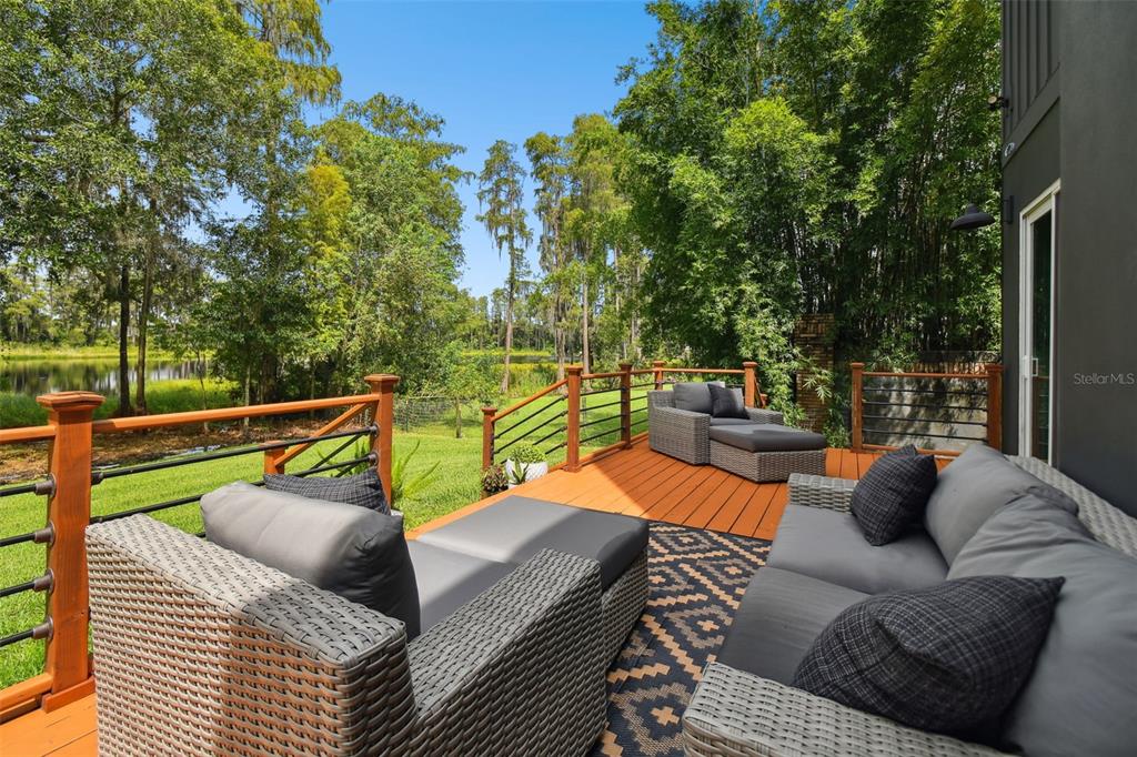 7515 North Mobley Road Odessa, FL 33556 - Photo 34 of 42 Sit out on your deck and enjoy the views.