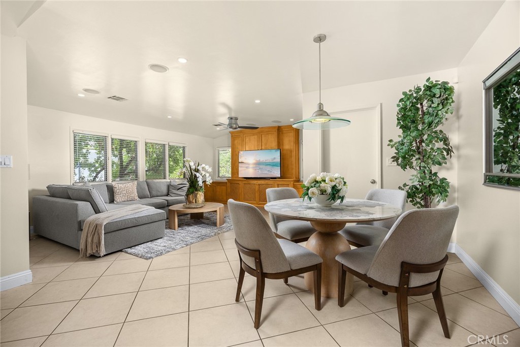 1439 Wembley Road San Marino, CA 91108 - Photo 30 of 45 a living room with furniture a window and a dining table