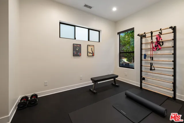a view of a hallway with workspace