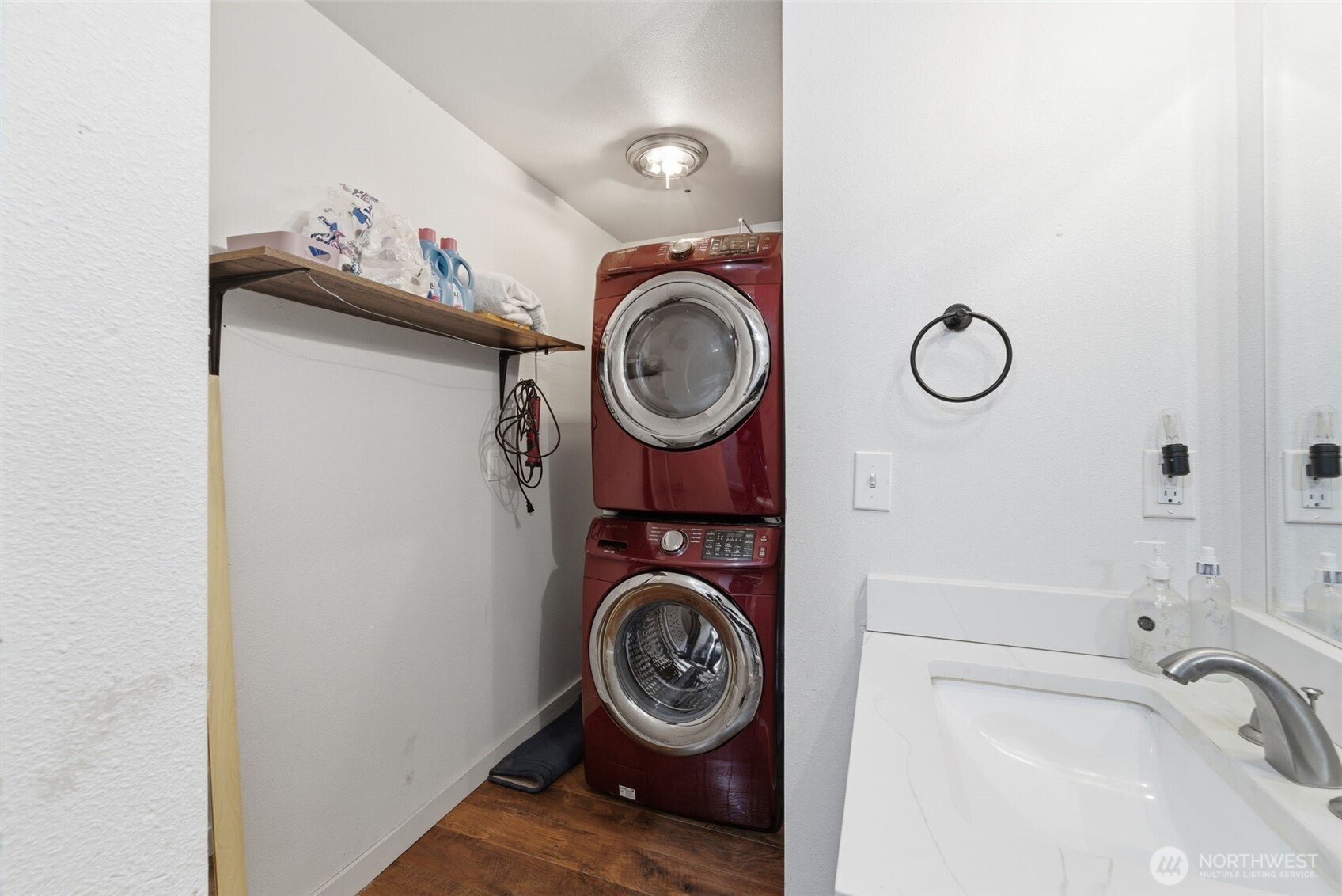 306 East 5th Street Warden, WA 98857 - Photo 16 of 19 a view of washer and dryer with bathroom in the background