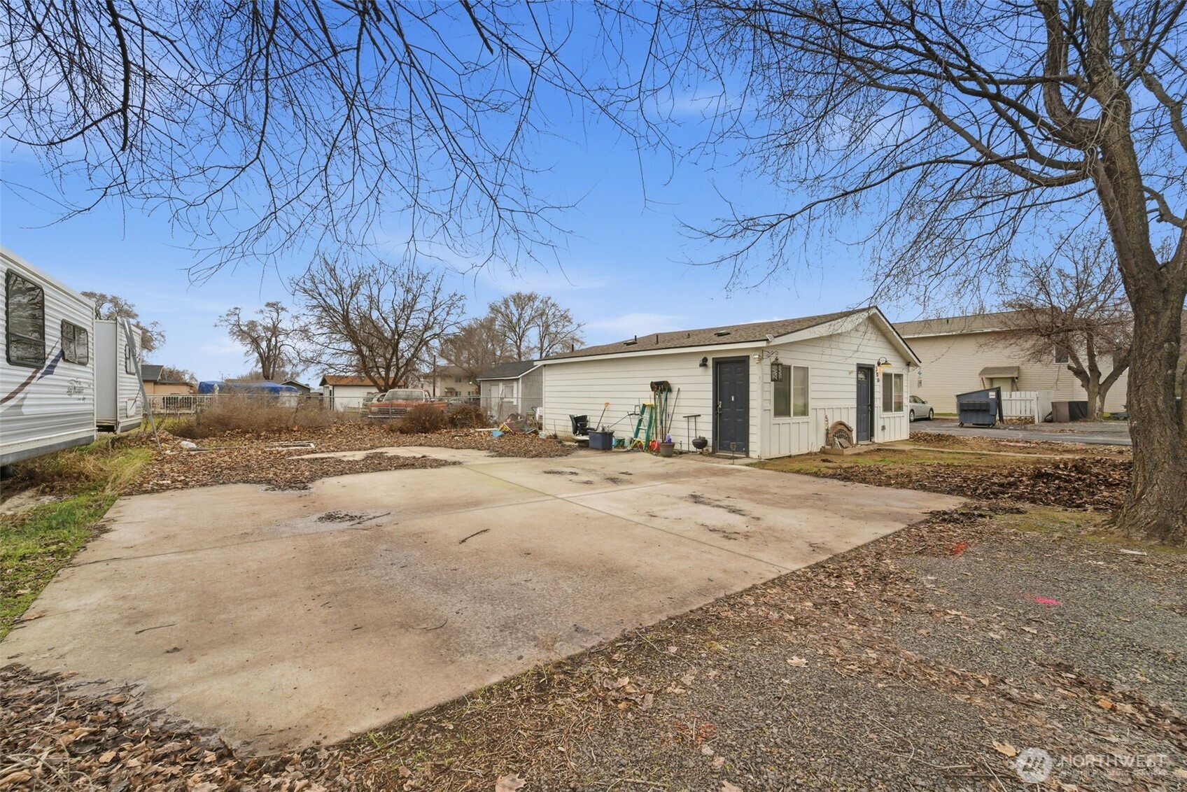 306 East 5th Street Warden, WA 98857 - Photo 2 of 19 a view of a house with a yard covered in snow