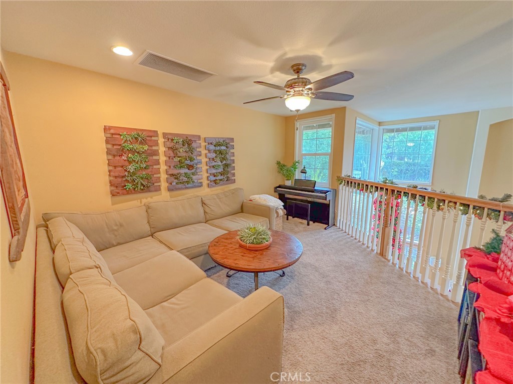 31785 Vía Del Viento Trabuco Canyon, CA 92679 - Photo 14 of 50 a living room with furniture and a large window