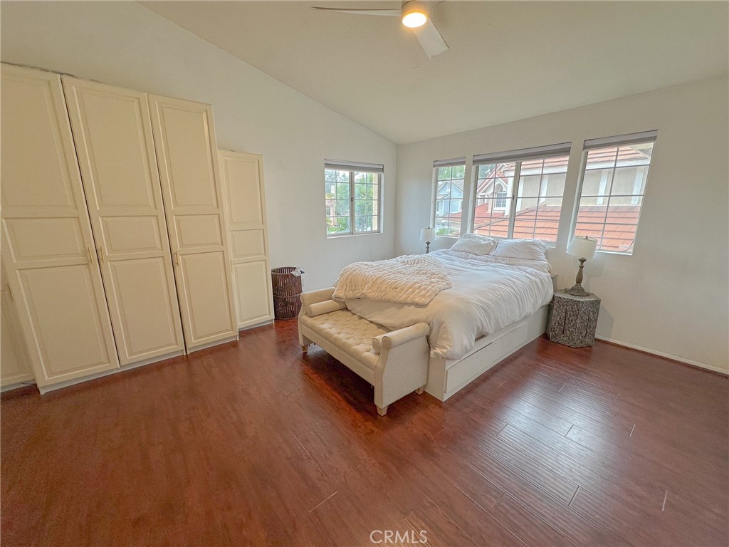 31785 Vía Del Viento Trabuco Canyon, CA 92679 - Photo 15 of 50 a spacious bedroom with a bed and a window