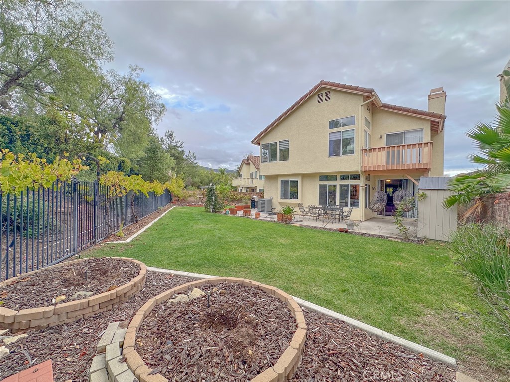 31785 Vía Del Viento Trabuco Canyon, CA 92679 - Photo 31 of 50 a view of a house with a yard porch and sitting area