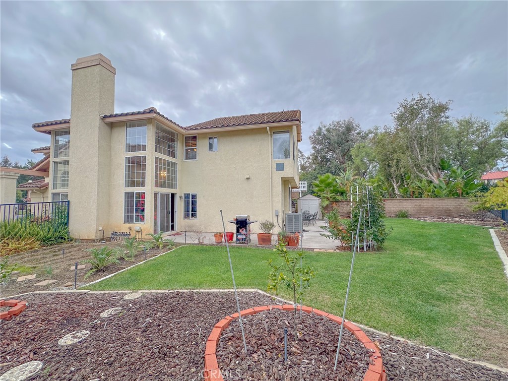 31785 Vía Del Viento Trabuco Canyon, CA 92679 - Photo 32 of 50 a view of a house with a backyard